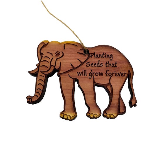 Elephant Planting seeds that will grow forever - Cedar Ornament Elephant Planting seeds that will grow forever - Cedar Ornament