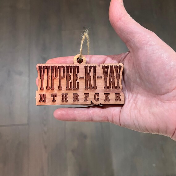 Yippee-ki-yay - Cedar Ornament Yippee-ki-yay - Cedar Ornament