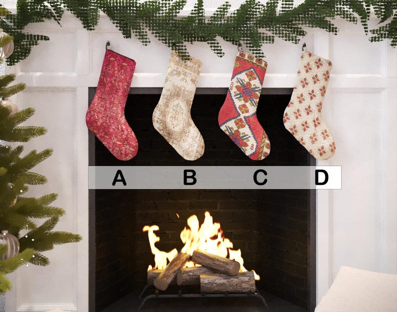 Set of 4 handmade vintage-style Christmas stockings, including red, beige floral, and a traditional red and blue Turkish kilim print, hanging on a fireplace mantel.
