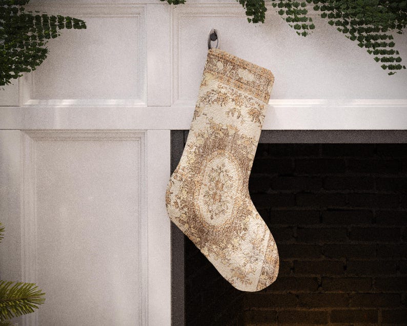 Set of 4 handmade vintage-style Christmas stockings, including red, beige floral, and a traditional red and blue Turkish kilim print, hanging on a fireplace mantel.