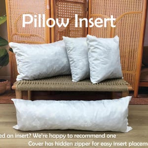a set of white pillows on a woven bench, with a potted plant in the background. The text overlay suggests that the pillows are an insert that can be used to cover a pillowcase, and the image is promoting the use of the pillow insert.