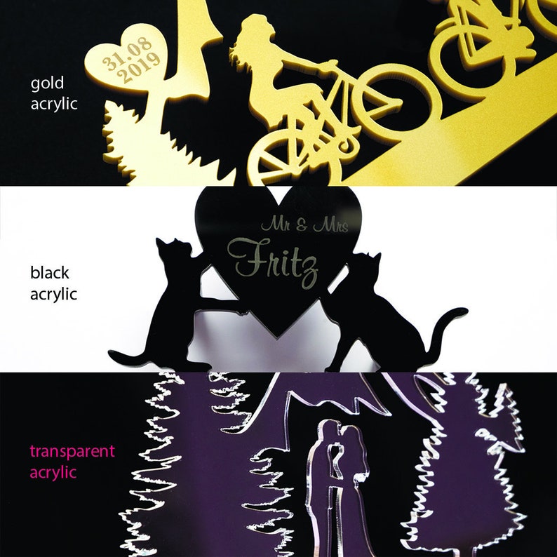May include: A collection of acrylic cake toppers in gold, black, and transparent. Designs include a cyclist, a heart with the text "Mr & Mrs Fritz", a couple, and a date. Ideal for weddings and special events.