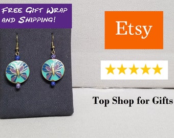 Beautiful butterfly earrings with free gift wrapping and free shipping! Antique brass with gorgeous blues, greens and purples.