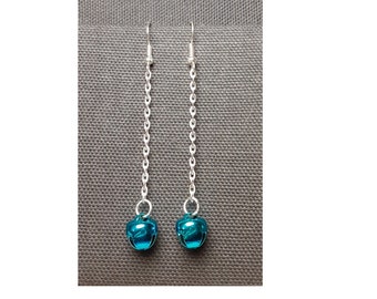 Long blue jingle bell earrings, with free gift wrapping and free shipping! 2.75 inches long on silver chains. Elegant holiday earrings!