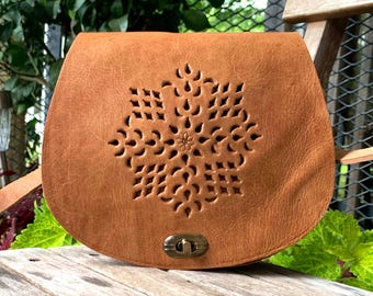 Genuine full grain leather handbag with engraved patterns