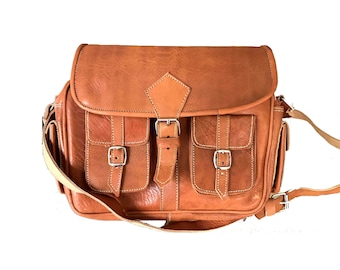 Multi-pocket shoulder handbag in genuine full grain leather