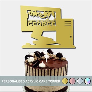 May include: Gold acrylic cake topper featuring the text "Happy 30th Birthday George" and a design of a laptop computer. The topper is displayed on a cake with chocolate frosting and Oreo cookies.