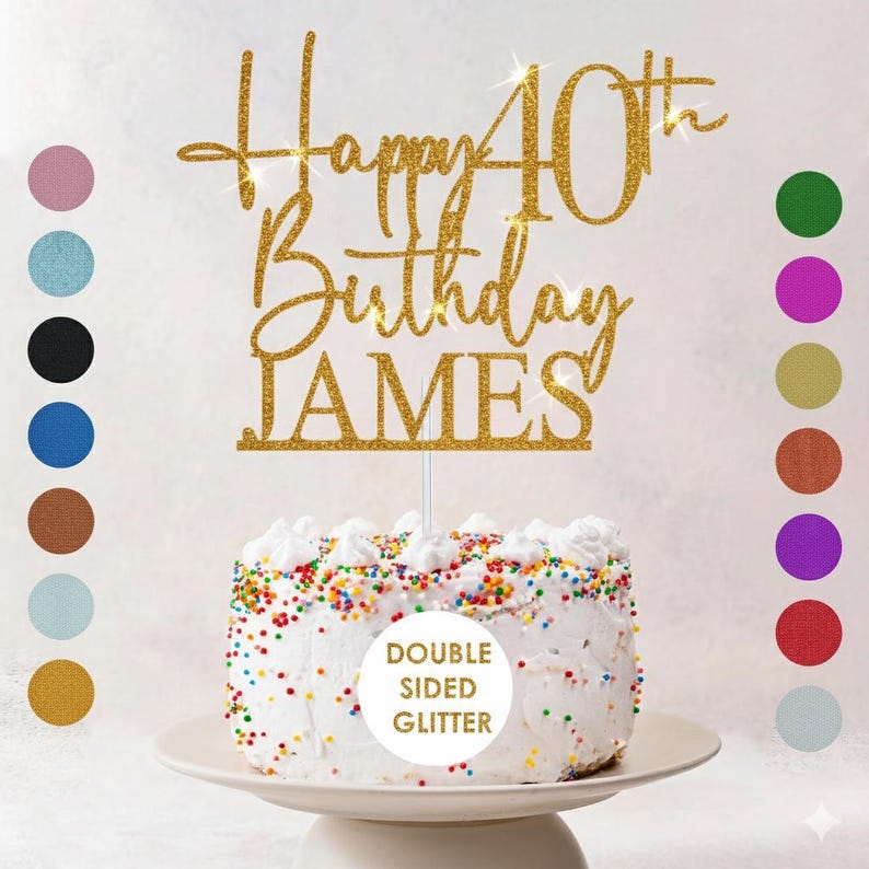 May include: A gold glitter cake topper that reads "Happy 40th Birthday JAMES". The topper is placed on top of a white frosted cake with colorful sprinkles. The cake is on a white cake stand. The text "DOUBLE SIDED GLITTER" is on the cake.