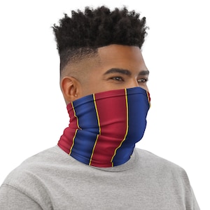May include: A blue and red striped face mask with yellow accents. The mask is made of a soft, breathable fabric and is designed to be comfortable to wear.