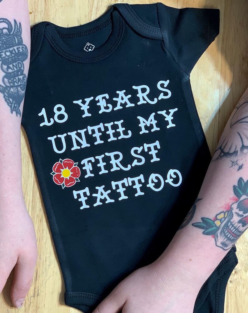 18 Years Until My First Tattoo black baby Onesie.