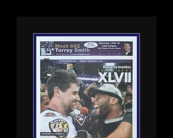 Baltimore Ravens - 2013 NFL Super Bowl Title - Baltimore Sun Newspaper - "WHAT A RIDE" - Double Matted & Framed in Authentic Team Colors