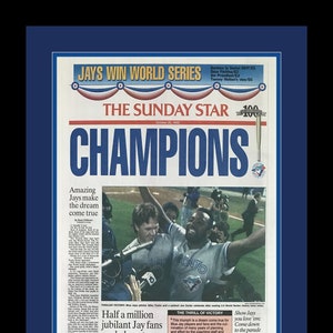 Toronto Blue Jays - 1992 World Series Champions - Toronto Star Newspaper - &quot;CHAMPIONS!&quot; - Double Matted & Framed in Authentic Team Colors
