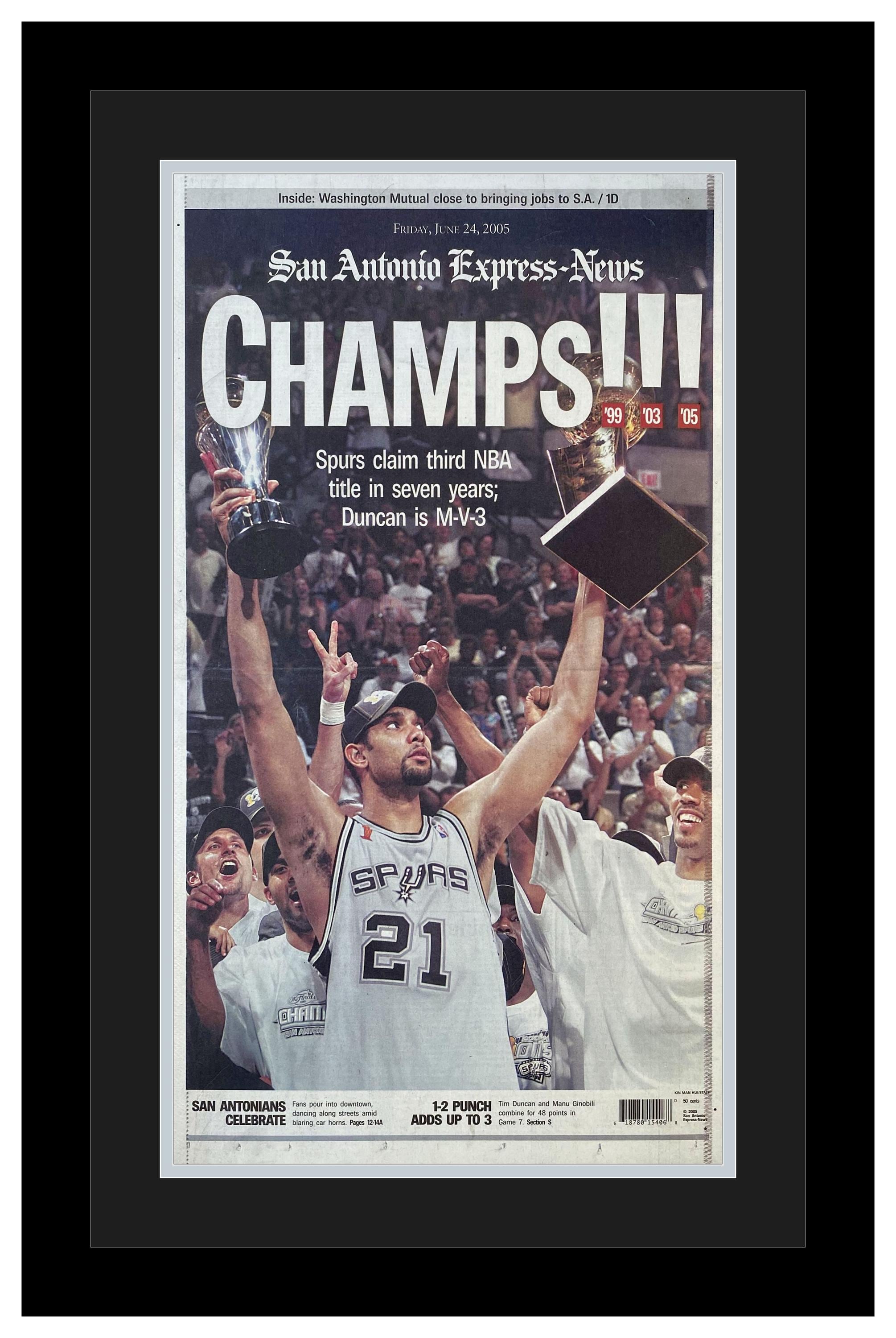 San Antonio Spurs / Tim Duncan – 2005 NBA Title – The San Antonio Express – “CHAMPS” – Double Matted & Framed in Authentic Team Colors