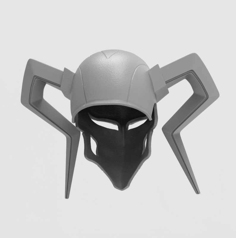 May include: A gray helmet with a black face mask and angular, horn-like protrusions. The helmet has a textured surface and a pointed design on the forehead. The face mask has eye and mouth openings.