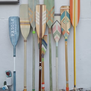 Custom Hand Painted Oars. Logos, Lake names, weddings, corporate, endless!