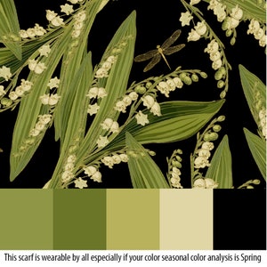 May include: A black background with a repeating pattern of white lily of the valley flowers and green leaves. A gold dragonfly is flying above the flowers. The image is a color palette of green and beige.