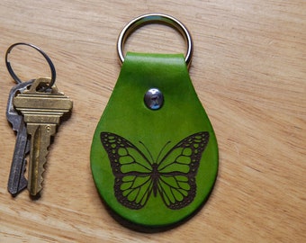 Llavero de cuero con forma de mariposa