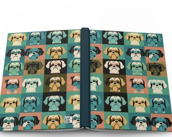 May include: Open journal with a colorful pattern of Shih Tzu dog faces in a grid. The cover features a variety of colors, including teal, brown, and black. The spine is a dark teal color.