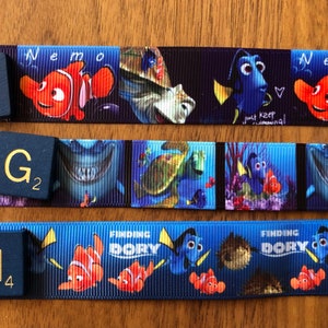 Lanyard badge set DCL Disney cruise; Finding Nemo key to the world; Aulani