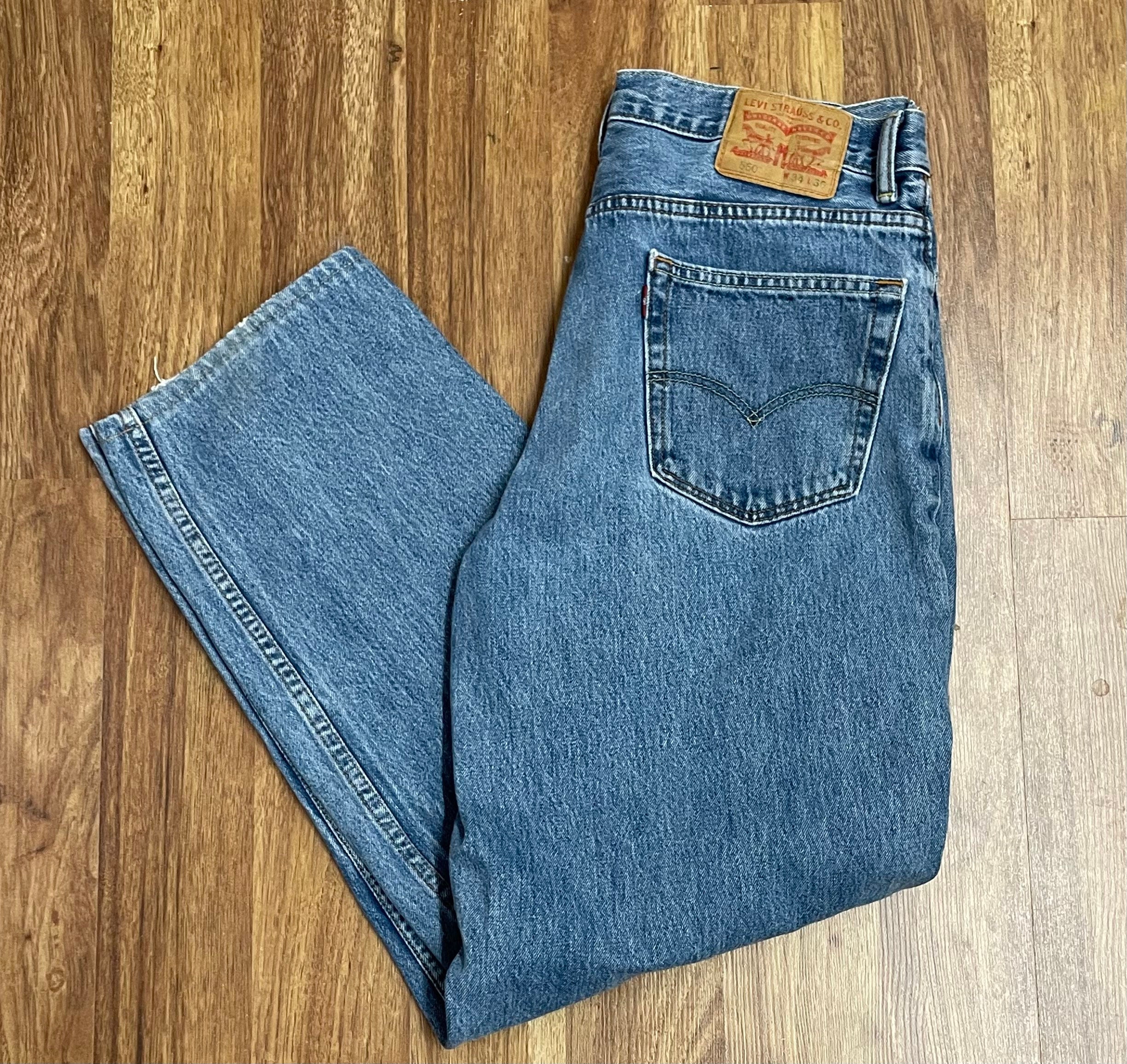 34x30 Vintage Levis 560 Made in USA Faded Light Wash Jeans