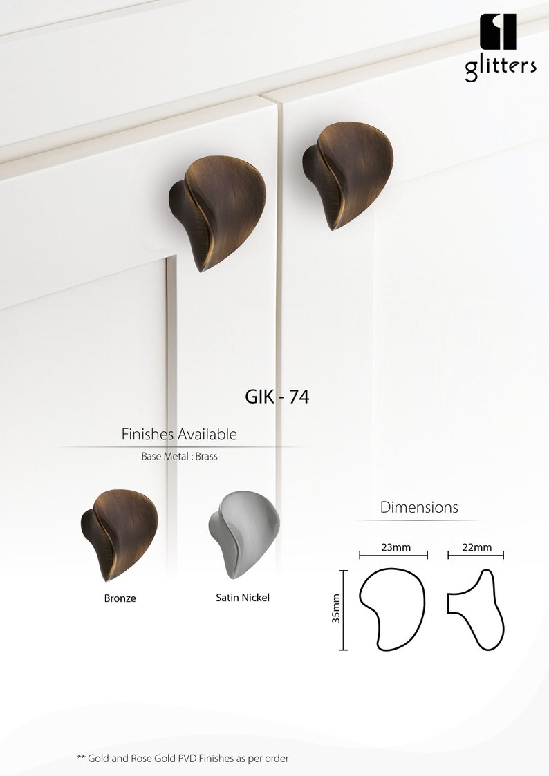 May include: A pair of cabinet knobs in bronze and satin nickel finishes. The knobs are shaped like a leaf and have a 3.5 inch (8.9 cm) projection. The text "GIK - 74" is visible in the image.