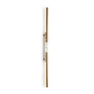 May include: A gold wall sconce with a white marble insert. The sconce has a long, thin design and is perfect for adding a touch of modern elegance to any room.