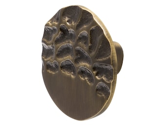 Ronde messing knop met gehamerde textuur, decoratieve hardware