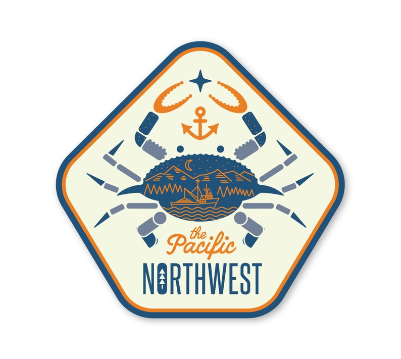 May include: A blue and orange illustrated sticker featuring a crab with a ship and mountains inside its shell. The text "the Pacific NORTHWEST" is below the crab.