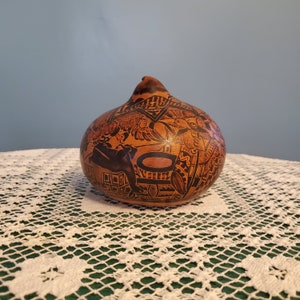Peruvian Gourd Art: Hand-Carved Storytelling Artwork