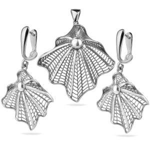 May include: A silver filigree pendant necklace and matching earrings set. The pendant and earrings are shaped like a stylised shell with a delicate, intricate design.