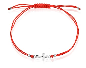 May include: Red string bracelet with a silver cross charm. The bracelet is adjustable and has a sliding knot closure.