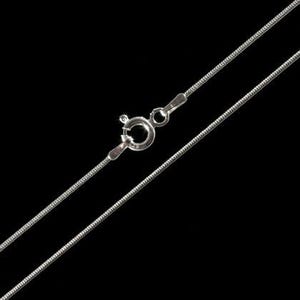 May include: A thin, silver-coloured snake chain necklace featuring a round spring ring clasp. The metallic chain has a smooth, flexible texture and a reflective finish, with the circular clasp mechanism positioned centrally on the chain.