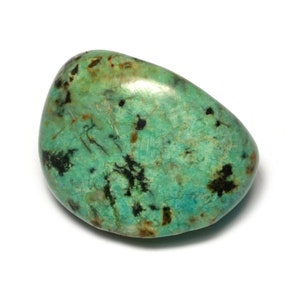 May include: A smooth, green and black, polished, oval-shaped gemstone.