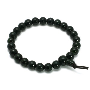 May include: A black beaded bracelet with a dark green hue. The bracelet is made of round beads and has a simple knot closure.