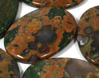 May include: A collection of polished oval-shaped stones with a green, brown, and orange mottled pattern.