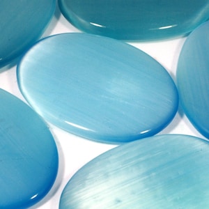 Turquoise kattenoogpalmsteen ~70x50mm | PS92