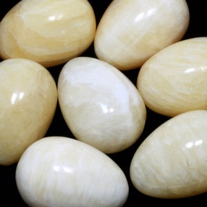 Ivory Calcite Crystal Egg ~48mm | EM102