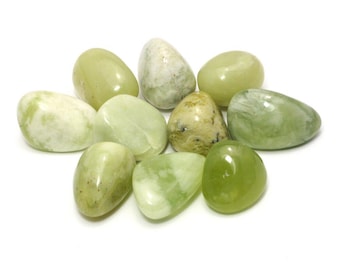 May include: A selection of smooth, polished jade stones in shades of green, some with white veining. The stones are oval and rounded, presented against a white backdrop. Measurements are in centimetres.