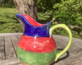 A happy hand painted jug