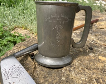 A pewter tankard golf trophy awarded to the winner of The Daily Telegraph and Morning Post competition.