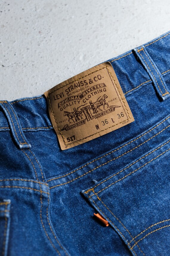 Vintage 90s 00s Blue Levi’s 527  Distressed Bootcut Denim Jeans 28 Waist S