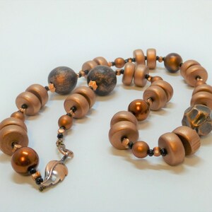 Lange Kette Holzscheiben Kupfer metallic , BiB-Kette, Holzkette