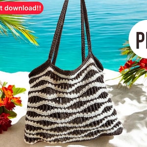 May include: A handmade crochet tote bag with a wavy pattern in brown and white. The bag has long straps and is displayed on a sandy beach with a turquoise ocean background. Text on the image says "Instant download!!" and "PDF".