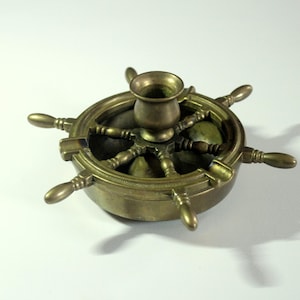 Solid brass ashtray in the shape of a steering wheel with candle holder, vintage from the 1960s, mid century, solid brass ashtray