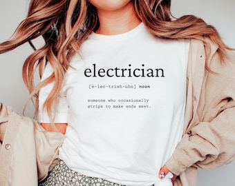 May include: White t-shirt with black text that reads "electrician [e-lec-trish-uhn] noun someone who occasionally strips to make ends meet."
