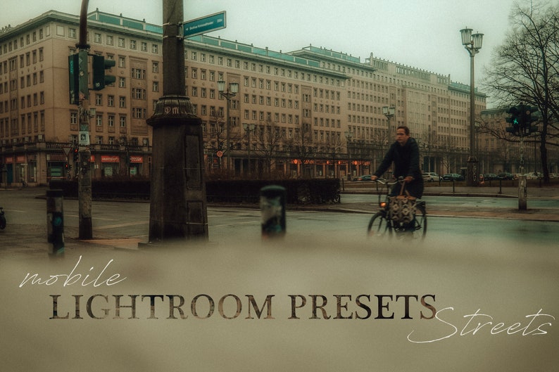 May include: A person rides a bicycle down a city street in front of a large building. The image is faded and has a vintage look. The text "mobile LIGHTROOM PRESETS streets" is at the bottom of the image.