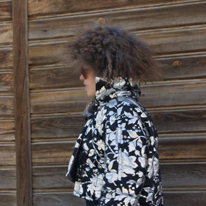 Quilted fall jacket byMasha . Cotton black jacket kimono with the silver rouses