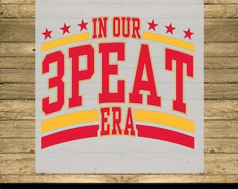 May include: Red and yellow iron-on transfer with the text "In Our 3peat Era".
