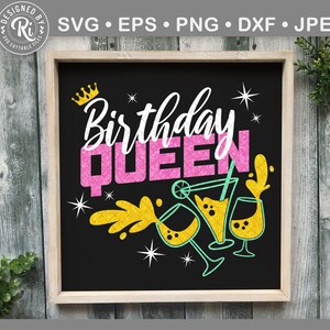May include: A black chalkboard sign with a white background and the text "Birthday Queen" in pink and yellow letters. There are gold stars and a crown above the text and a yellow and green illustration of a cocktail drink below the text.