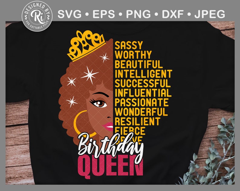 May include: A black t-shirt featuring a graphic design of a woman with an afro wearing a crown. The text "Birthday Queen" is written in pink letters below the woman's face. The text "Sassy, Worthy, Beautiful, Intelligent, Successful, Influential, Passionate, Wonderful, Resilient, Fierce" is written in yellow letters to the right of the woman's face.